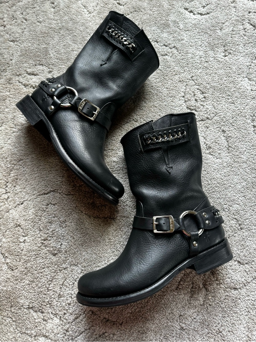 Women’s black leather Frye harness boots